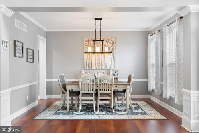 124 Willow Grove Mill Dr, Middletown, DE 19709 - dining area with wood finished floors, a chandelier, ornamental molding, and baseboards
