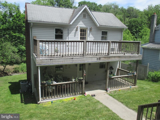 210 E Reynolds St, Cumberland, MD 21502 - view of front of property featuring a front lawn, a patio area, and a wooden deck