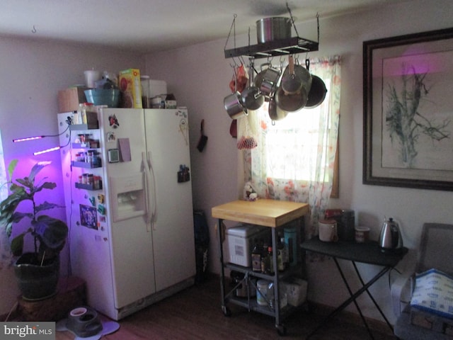 210 E Reynolds St, Cumberland, MD 21502 - kitchen with white fridge with ice dispenser and wood finished floors