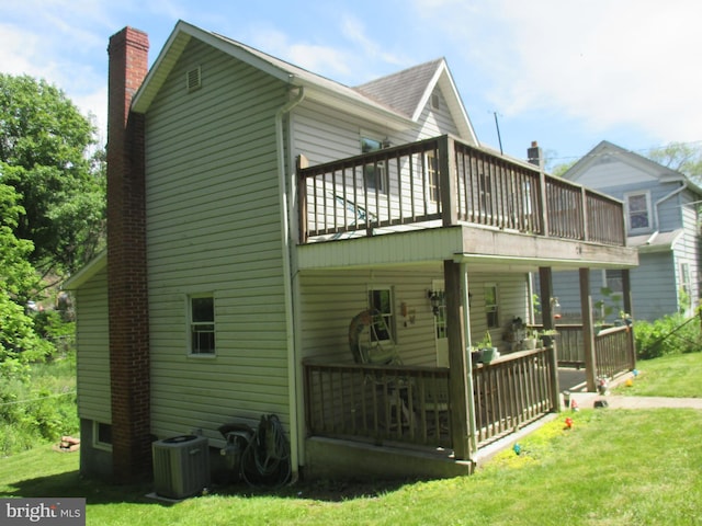 210 E Reynolds St, Cumberland, MD 21502 - view of side of home featuring central AC unit, a chimney, a yard, and a deck