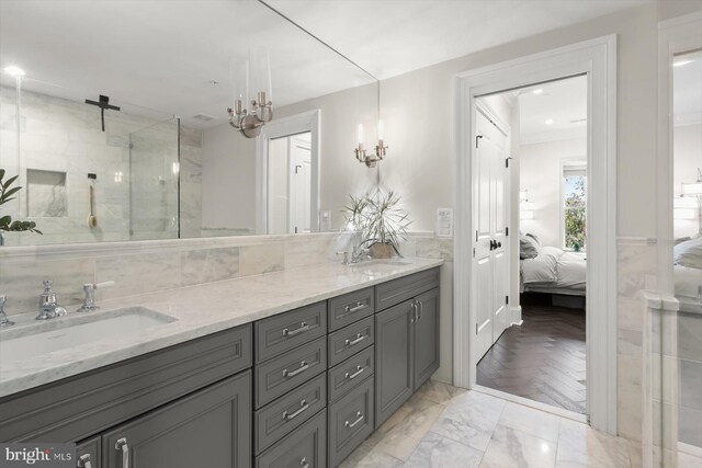 1775 Church St NW Unit 8, Washington, DC 20036 - bathroom featuring double vanity, ensuite bath, a stall shower, marble finish floors, and recessed lighting