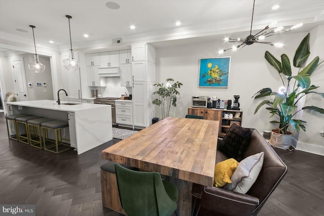 1775 Church St NW Unit 8, Washington, DC 20036 - dining room featuring recessed lighting, a chandelier, ornamental molding, and baseboards