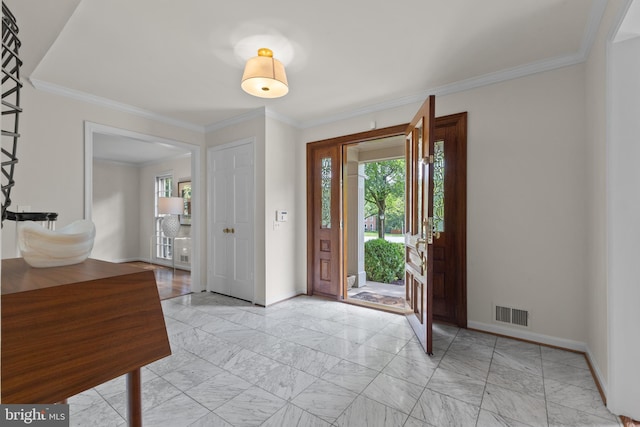 3713 Templeton Pl, Alexandria, VA 22304 - foyer with plenty of natural light, baseboards, crown molding, and light marble finish floors