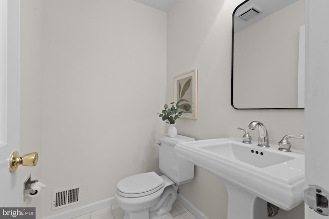 3713 Templeton Pl, Alexandria, VA 22304 - bathroom featuring toilet, tile patterned floors, baseboards, and a sink