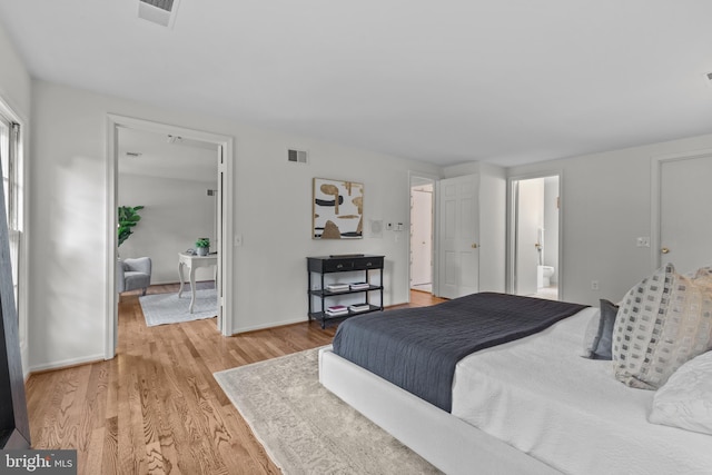 3713 Templeton Pl, Alexandria, VA 22304 - bedroom featuring light wood-type flooring, baseboards, and ensuite bath