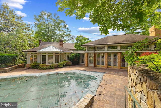 3713 Templeton Pl, Alexandria, VA 22304 - view of swimming pool featuring french doors, a patio, and a covered pool