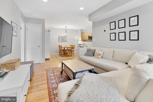 2050 N Calvert St Unit 106, Arlington, VA 22201 - living room with a chandelier, light wood-type flooring, and recessed lighting