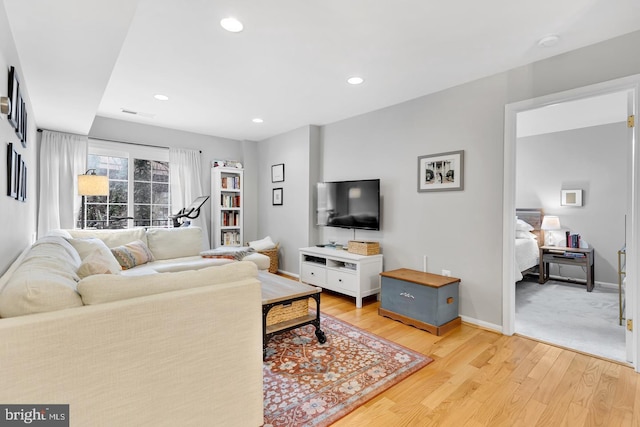 2050 N Calvert St Unit 106, Arlington, VA 22201 - living area featuring light wood-style flooring and recessed lighting