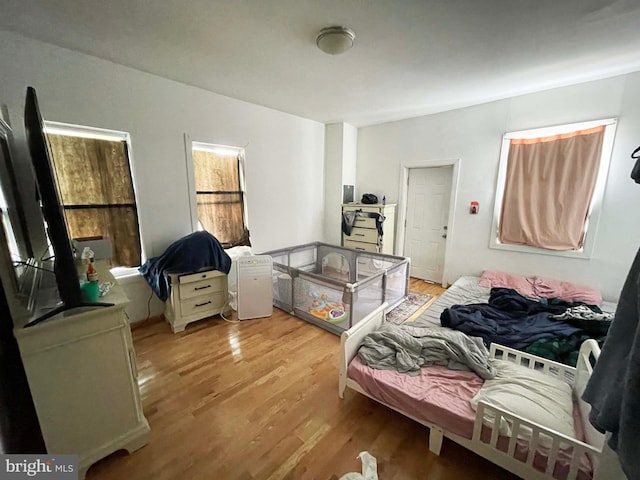 3647 N 19th St, Philadelphia, PA 19140 - bedroom with light wood-style flooring
