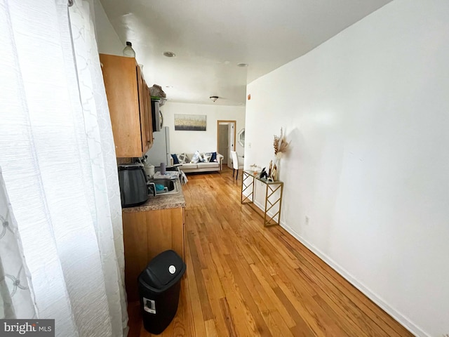 3647 N 19th St, Philadelphia, PA 19140 - corridor with light wood-style flooring and baseboards
