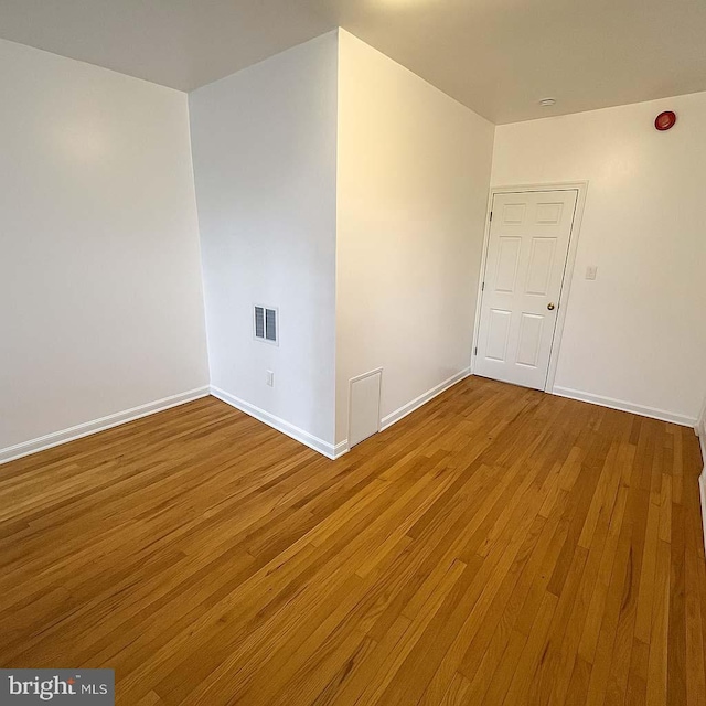 3647 N 19th St, Philadelphia, PA 19140 - empty room featuring wood finished floors and baseboards