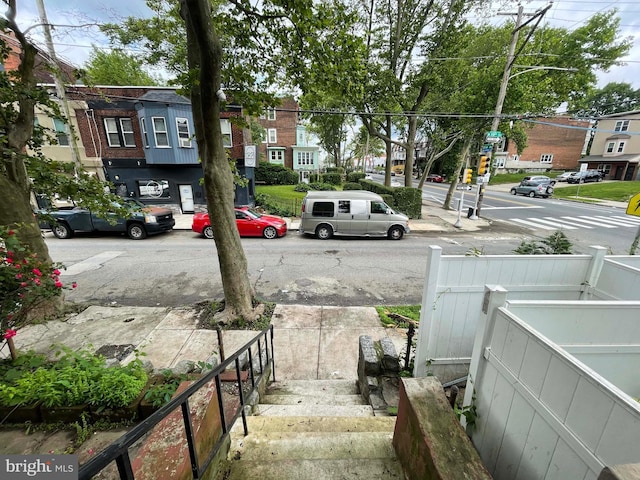 3647 N 19th St, Philadelphia, PA 19140 - view of asphalt road featuring street lighting, sidewalks, and curbs
