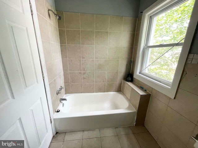 3647 N 19th St, Philadelphia, PA 19140 - bathroom with tile patterned flooring, shower / tub combination, and tile walls