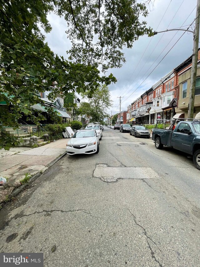 3647 N 19th St, Philadelphia, PA 19140 - view of asphalt street featuring sidewalks, curbs, and a residential view