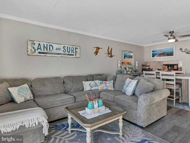 4711 Coastal Hwy Unit 538, Ocean City, MD 21842 - living area featuring ornamental molding, wood finished floors, and a ceiling fan