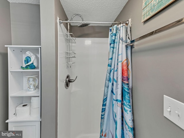 4711 Coastal Hwy Unit 538, Ocean City, MD 21842 - full bath featuring a textured ceiling and a shower with curtain