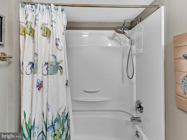 4711 Coastal Hwy Unit 538, Ocean City, MD 21842 - bathroom featuring shower / tub combo with curtain