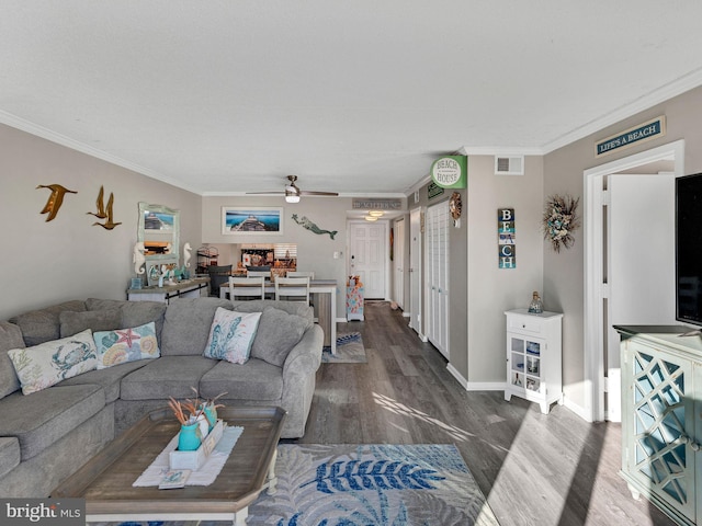 4711 Coastal Hwy Unit 538, Ocean City, MD 21842 - living room with wood finished floors, a ceiling fan, crown molding, and baseboards