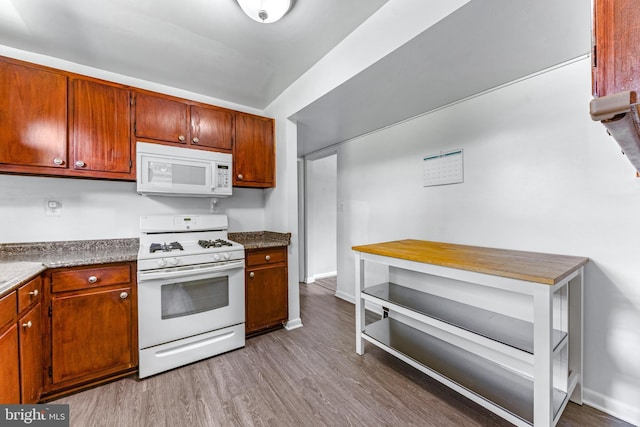 1302 Burlington Dr, Odenton, MD 21113 - kitchen featuring white appliances, wood finished floors, dark countertops, and baseboards