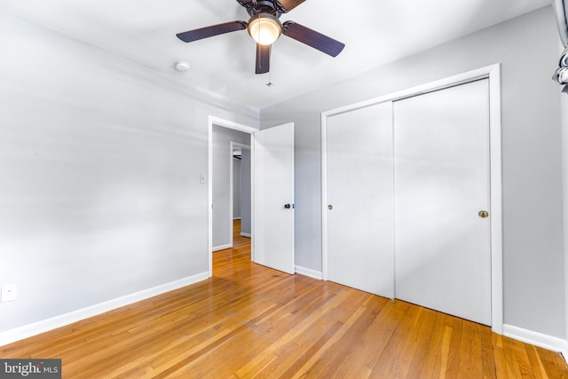 1302 Burlington Dr, Odenton, MD 21113 - unfurnished bedroom with a closet, light wood-style floors, baseboards, and ceiling fan