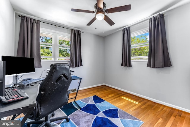 1302 Burlington Dr, Odenton, MD 21113 - home office with plenty of natural light, wood finished floors, and baseboards