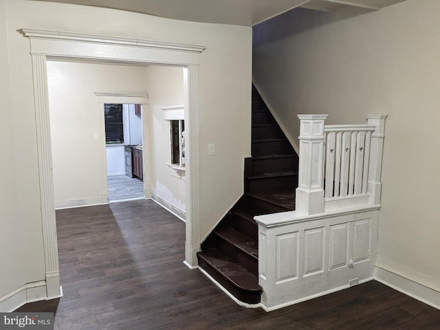 4303 N Franklin St, Philadelphia, PA 19140 - staircase featuring wood finished floors and baseboards