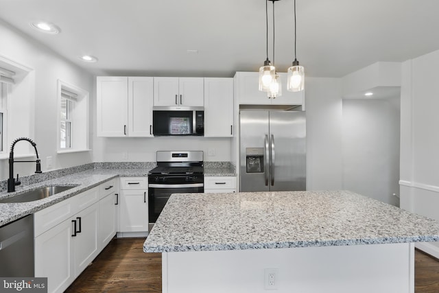 234 Linden Ave, Towson, MD 21286 - kitchen with appliances with stainless steel finishes, a sink, light stone counters, white cabinetry, and recessed lighting