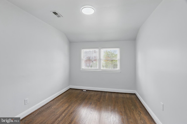 234 Linden Ave, Towson, MD 21286 - spare room with baseboards, wood finished floors, and lofted ceiling
