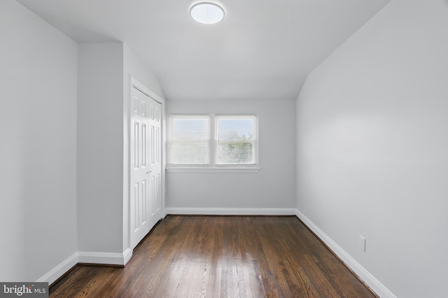 234 Linden Ave, Towson, MD 21286 - unfurnished bedroom with baseboards, a closet, and wood finished floors