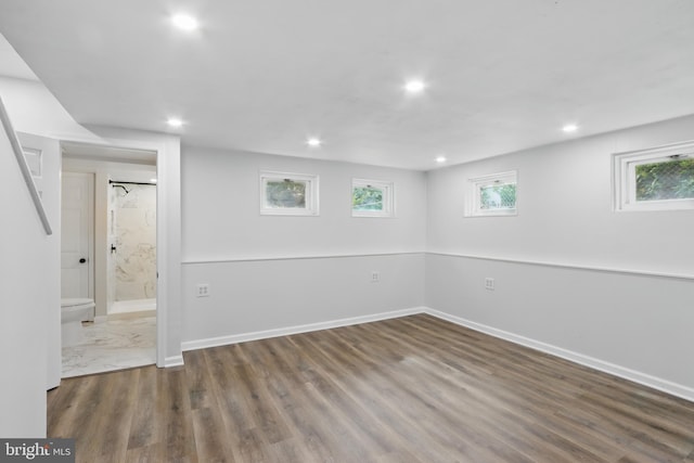234 Linden Ave, Towson, MD 21286 - basement featuring recessed lighting, wood finished floors, baseboards, and healthy amount of natural light