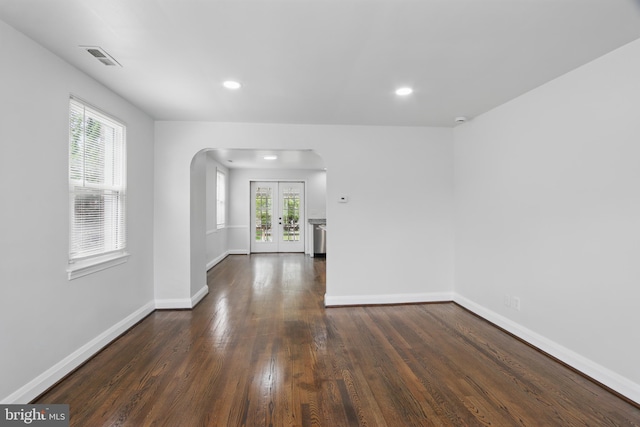 234 Linden Ave, Towson, MD 21286 - spare room with arched walkways, dark wood-type flooring, baseboards, and recessed lighting