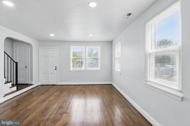 234 Linden Ave, Towson, MD 21286 - foyer entrance with dark wood-style flooring, stairway, arched walkways, baseboards, and recessed lighting