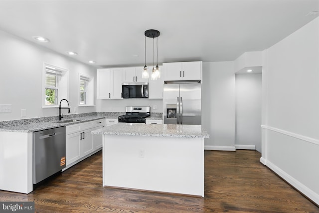 234 Linden Ave, Towson, MD 21286 - kitchen with stainless steel appliances, a sink, recessed lighting, light stone countertops, and white cabinetry