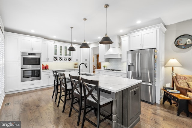 48 Avalon Ct Unit 2301, Doylestown, PA 18901 - kitchen with appliances with stainless steel finishes, a sink, custom range hood, dark wood-type flooring, and recessed lighting