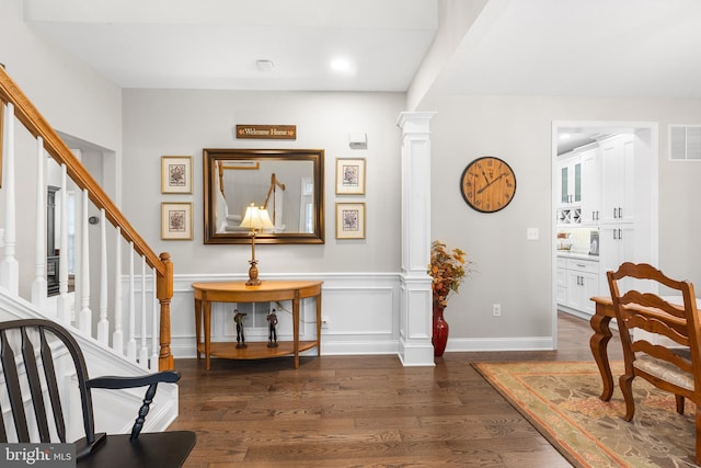 48 Avalon Ct Unit 2301, Doylestown, PA 18901 - hall with dark wood-style flooring, decorative columns, stairs, baseboards, and recessed lighting