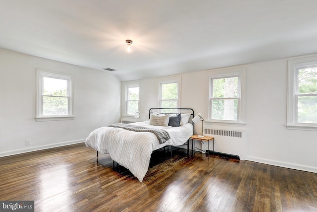 515 Devon Rd, Havertown, PA 19083 - bedroom featuring radiator, multiple windows, wood finished floors, and baseboards