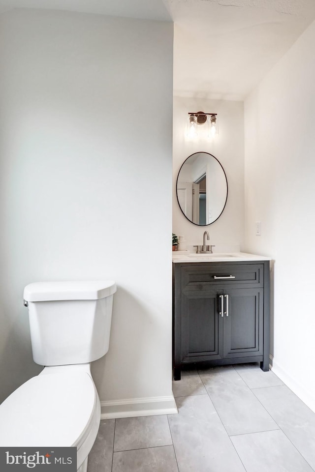 515 Devon Rd, Havertown, PA 19083 - bathroom featuring vanity, toilet, baseboards, and tile patterned flooring