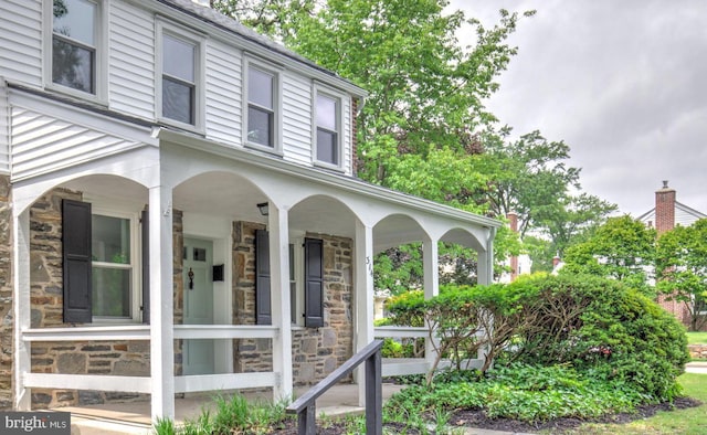 515 Devon Rd, Havertown, PA 19083 - view of property exterior featuring stone siding and a porch