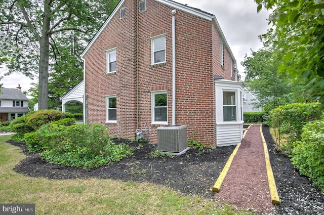 515 Devon Rd, Havertown, PA 19083 - view of home's exterior featuring central AC unit and brick siding