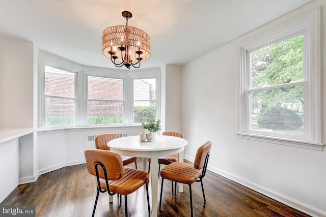 515 Devon Rd, Havertown, PA 19083 - dining area featuring plenty of natural light, dark wood finished floors, and a chandelier