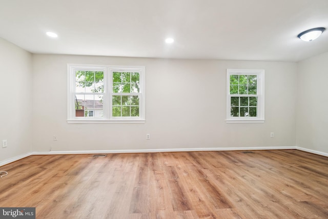 122 Sharpstead Ln, Gaithersburg, MD 20878 - unfurnished room with wood finished floors, baseboards, and recessed lighting
