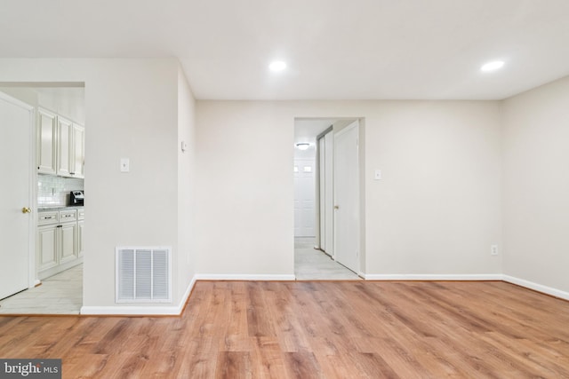 122 Sharpstead Ln, Gaithersburg, MD 20878 - spare room with light wood-style flooring, recessed lighting, and baseboards