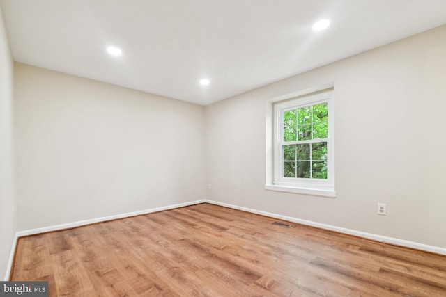 122 Sharpstead Ln, Gaithersburg, MD 20878 - spare room featuring wood finished floors, baseboards, and recessed lighting