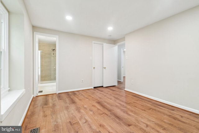 122 Sharpstead Ln, Gaithersburg, MD 20878 - unfurnished bedroom featuring light wood-type flooring, baseboards, recessed lighting, and connected bathroom