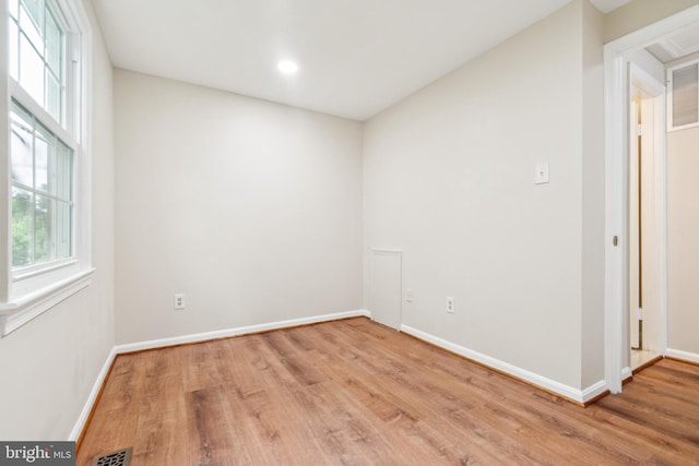 122 Sharpstead Ln, Gaithersburg, MD 20878 - spare room featuring wood finished floors, healthy amount of natural light, and baseboards