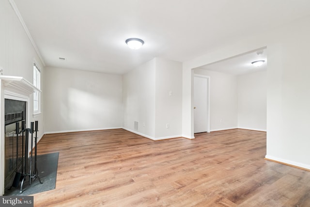 122 Sharpstead Ln, Gaithersburg, MD 20878 - unfurnished living room with wood finished floors, baseboards, and a glass covered fireplace