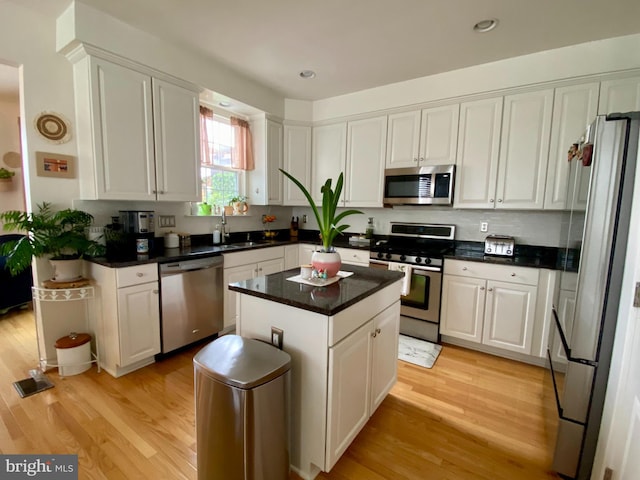 12954 Yellow Jacket Rd, Hagerstown, MD 21740 - kitchen featuring appliances with stainless steel finishes, white cabinetry, light wood-type flooring, and recessed lighting