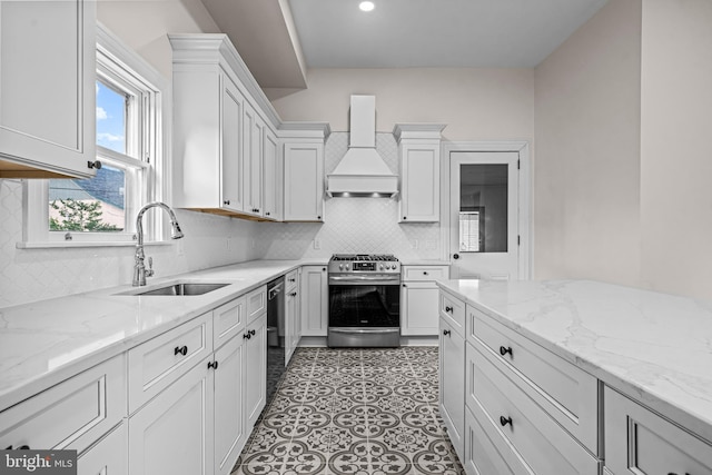 3 E Poplar St, Wenonah, NJ 08090 - kitchen featuring premium range hood, stainless steel gas range, a sink, white cabinets, and recessed lighting