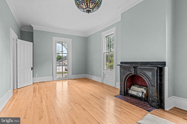 3 E Poplar St, Wenonah, NJ 08090 - unfurnished living room with plenty of natural light, hardwood / wood-style flooring, ornamental molding, and baseboards