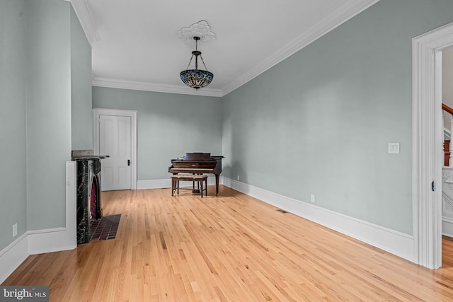 3 E Poplar St, Wenonah, NJ 08090 - spare room featuring wood finished floors, crown molding, and baseboards